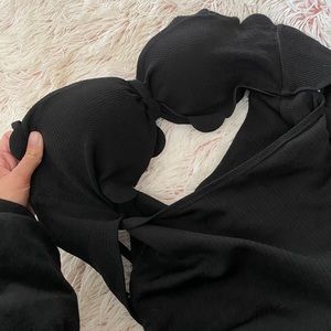 Black one piece ribbed swimsuit with scalloped cups!